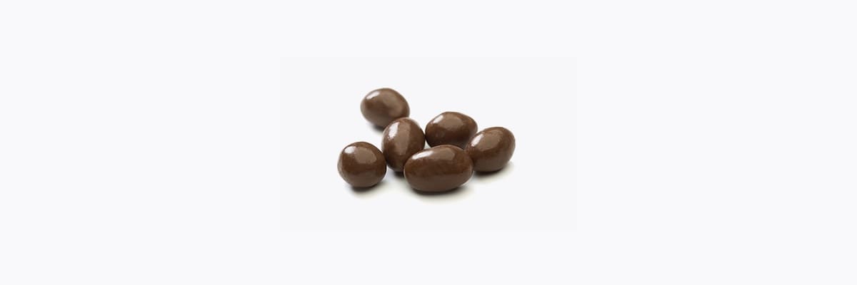 Fotografía de frutos secos Prunita con chocolate. Frutos secos con chocolate - Pasas con chocolate - Pistachos - arandanos - almendras - Prunita - Quiero Delicatessen - Villena - Alicante