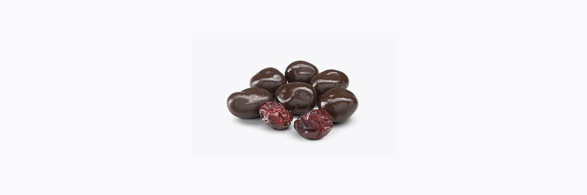 Fotografía de frutos secos Prunita con chocolate. Frutos secos con chocolate - Pasas con chocolate - Pistachos - arandanos - almendras - Prunita - Quiero Delicatessen - Villena - Alicante